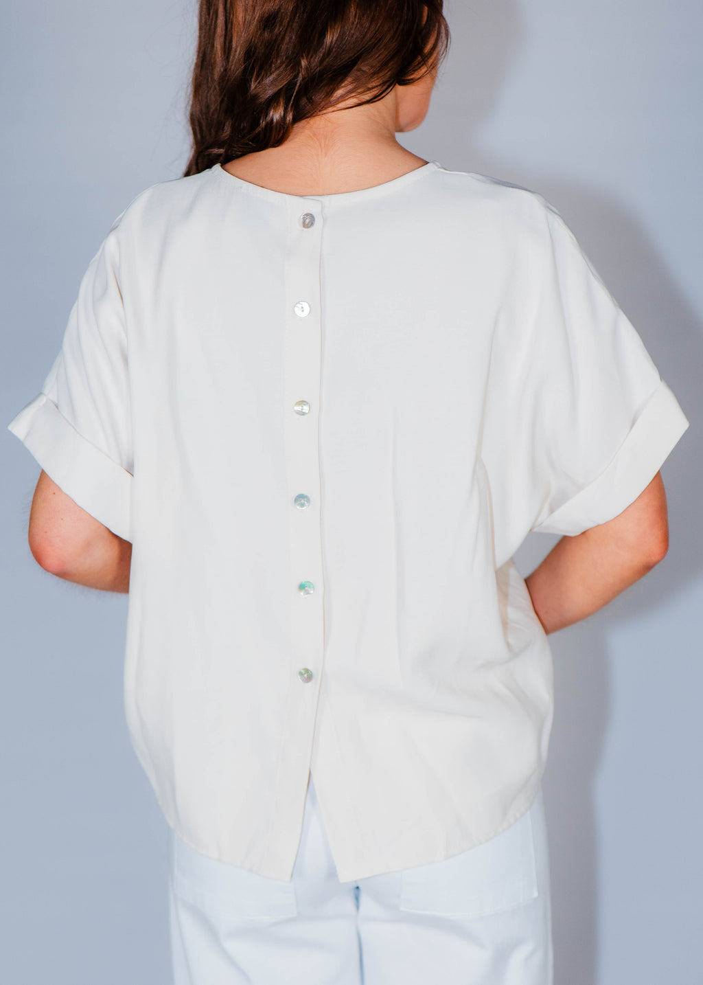 Blouse boutonnée dans le dos